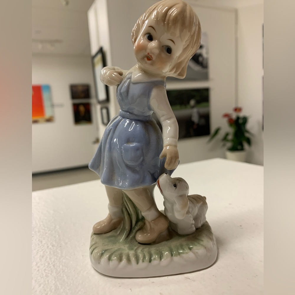 Porcelain Danish girl in blue jumper and  puppy figurine